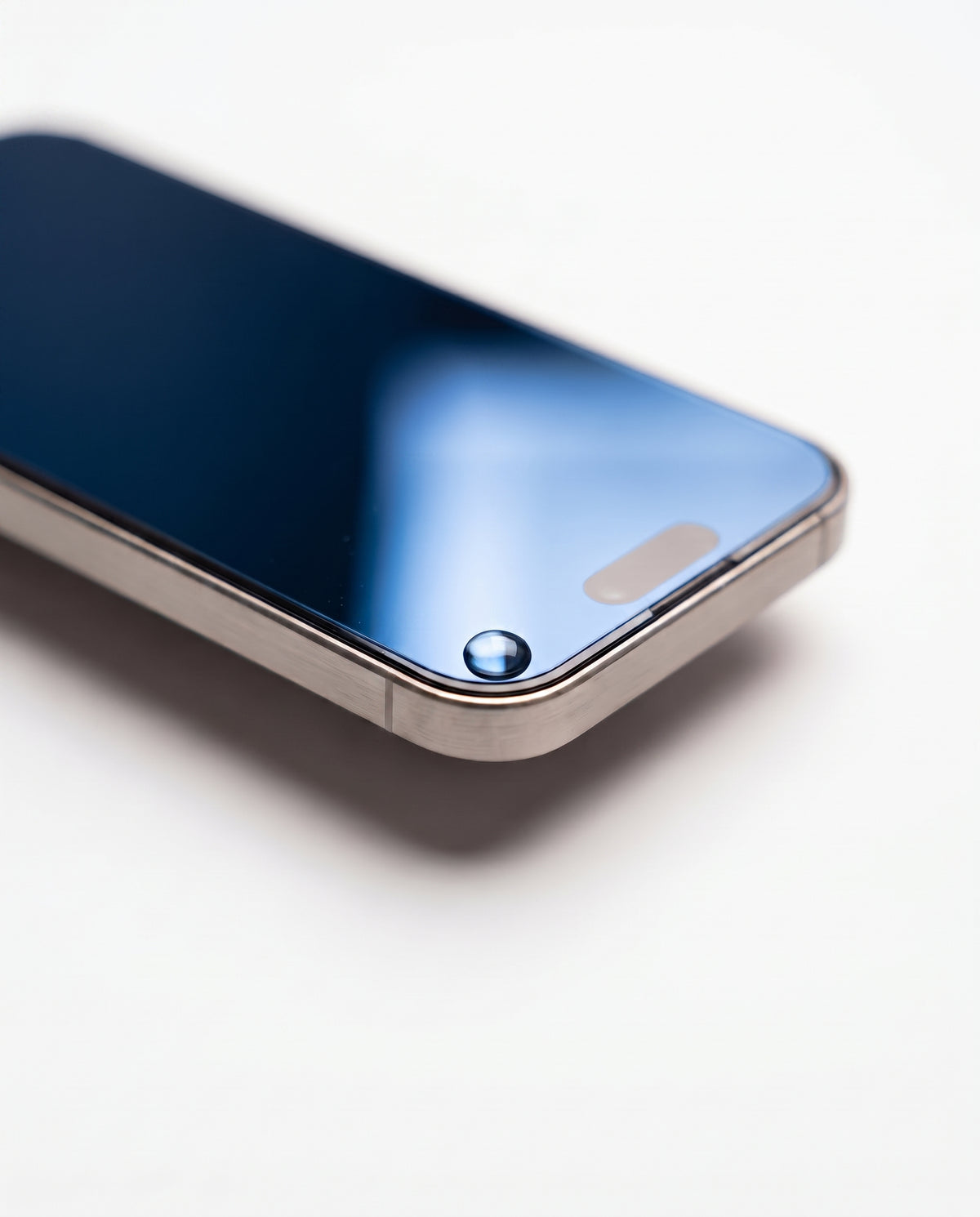 Deep Blue | Macro — protector edge, polished 2.5D edge, water bead, blue tint at an angle